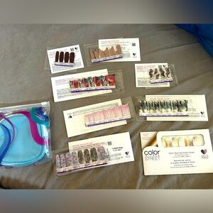 5 full sets, 3 mini sets of Colorstreet nail strips with a to go pouch